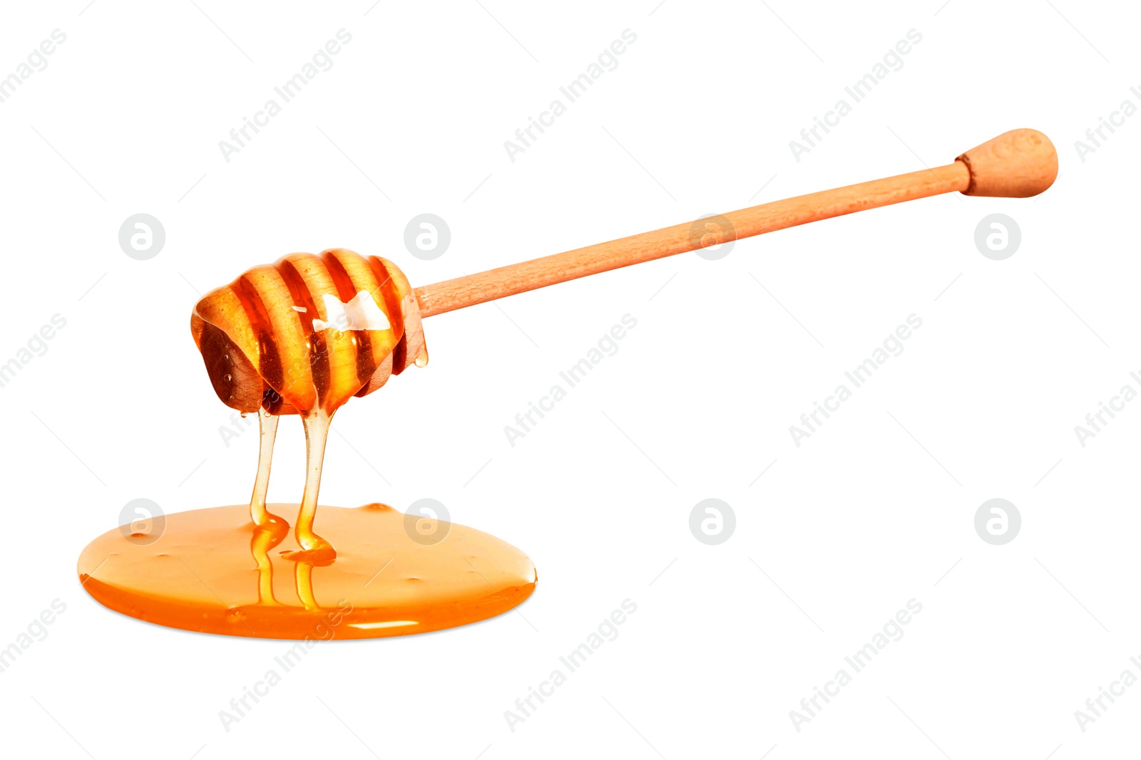 Image of Natural honey dripping from dipper on white background