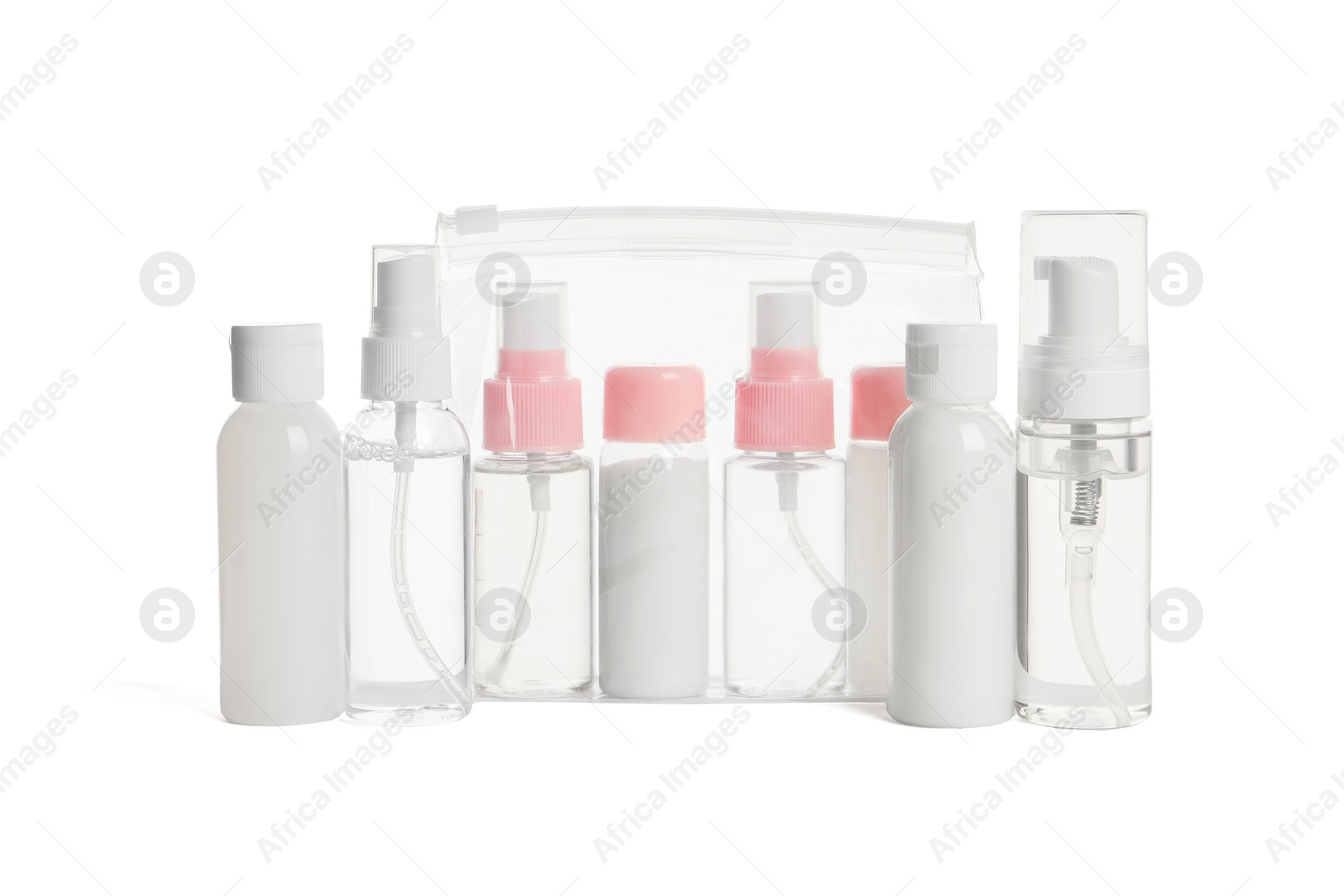 Photo of Cosmetic travel kit with plastic bag isolated on white