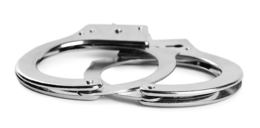 Photo of New classic chain handcuffs on white background