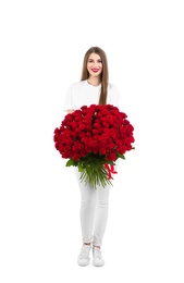 Full length portrait of beautiful woman with bouquet of roses on white background