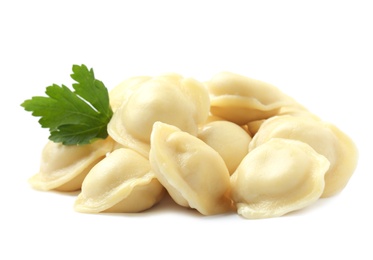 Boiled dumplings with parsley on white background