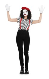 Photo of Funny mime with beret posing on white background