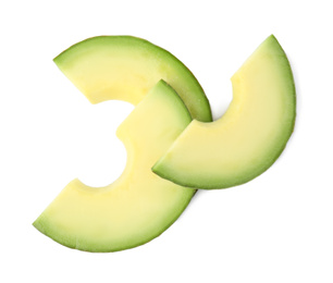 Photo of Slices of tasty ripe avocado on white background, top view
