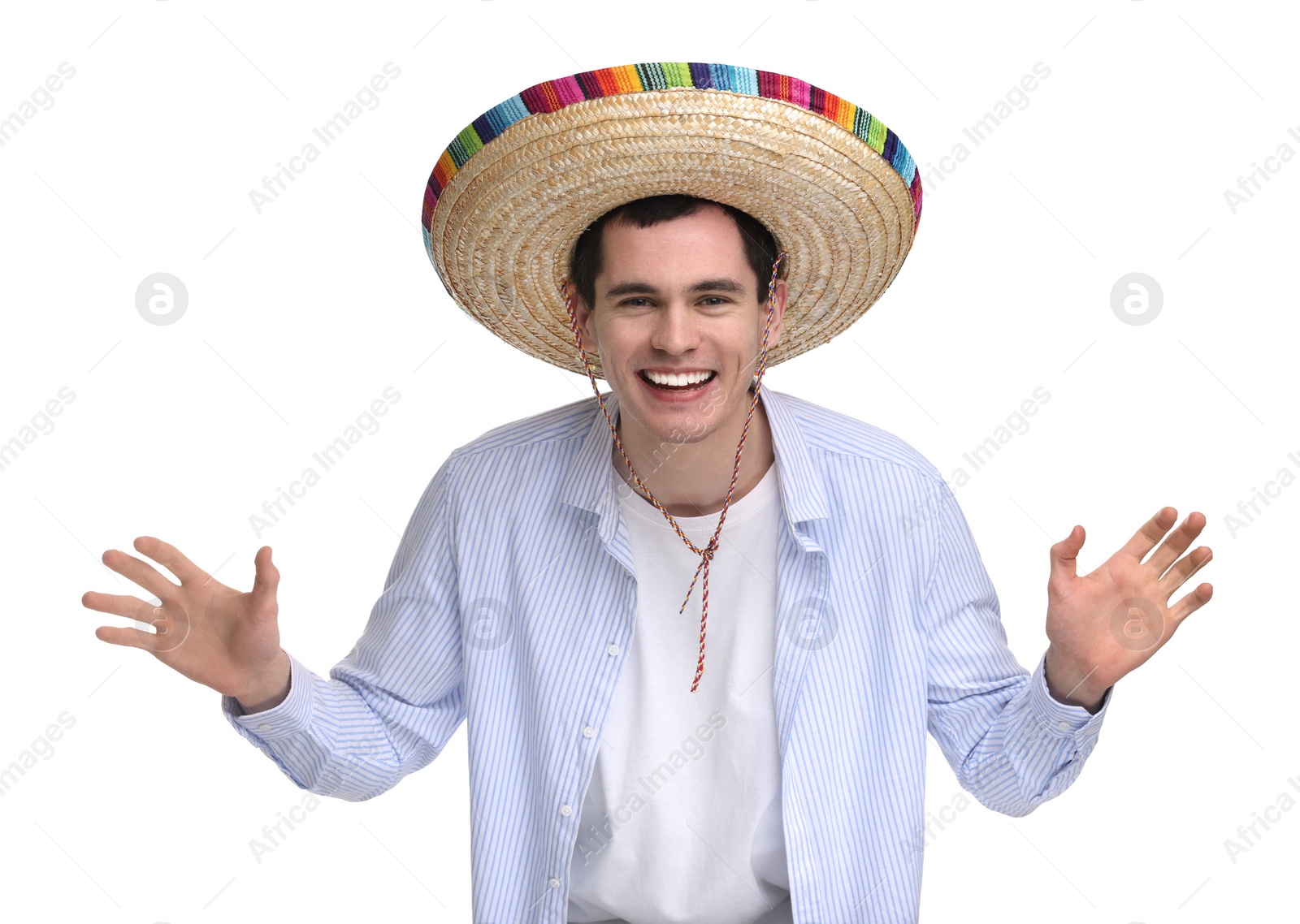 Photo of Young man in Mexican sombrero hat on white background