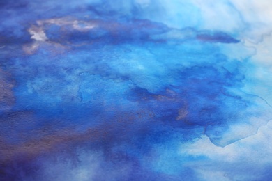Photo of Abstract colorful background, closeup. Painted sheet of paper