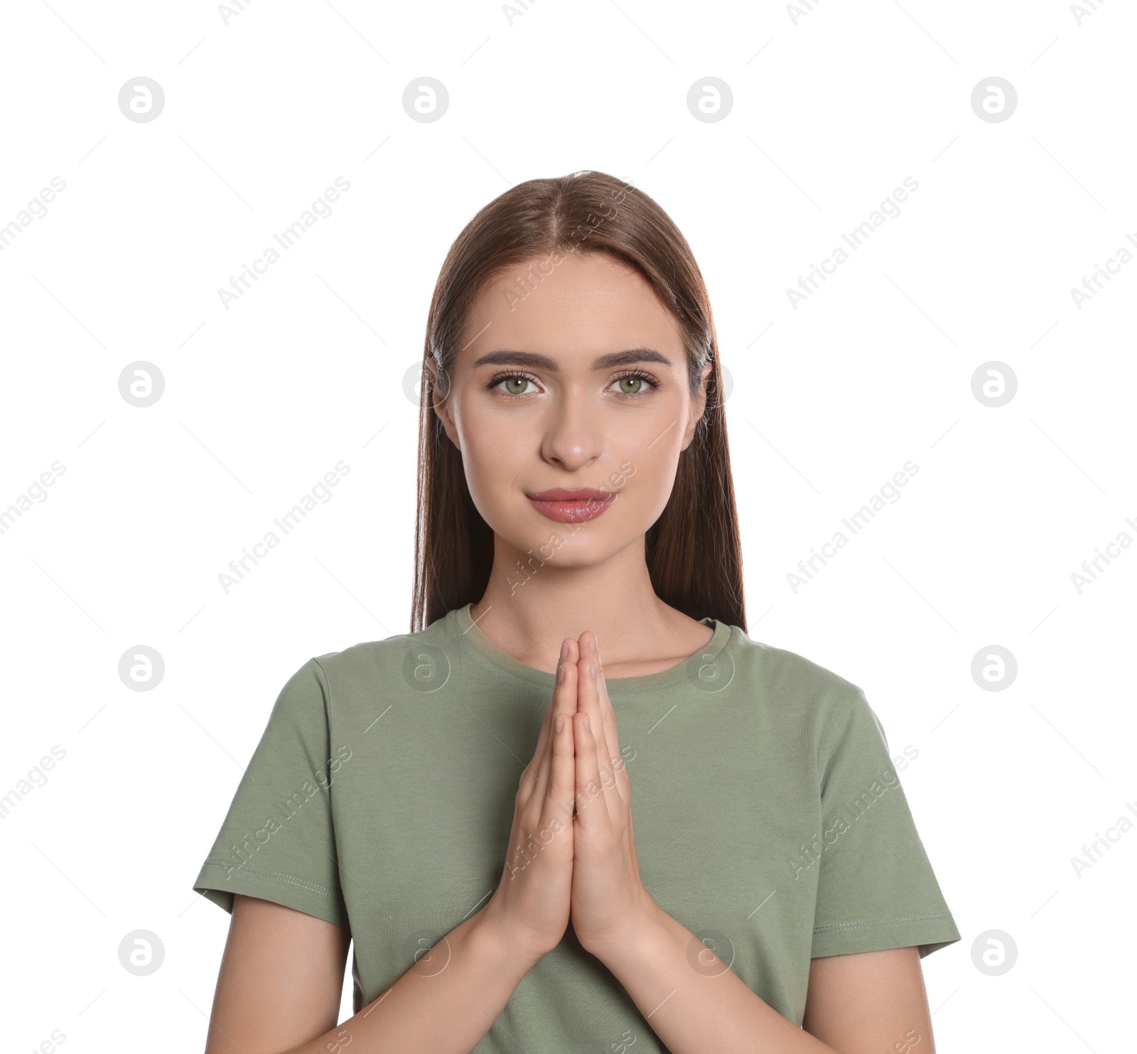 Photo of Woman with clasped hands praying on white background