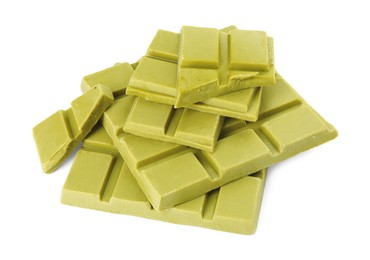 Photo of Pieces of tasty matcha chocolate bar isolated on white
