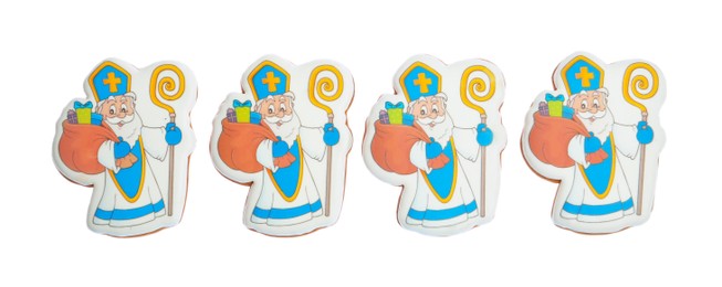 Photo of Tasty gingerbread cookies on white background, top view. St. Nicholas Day celebration