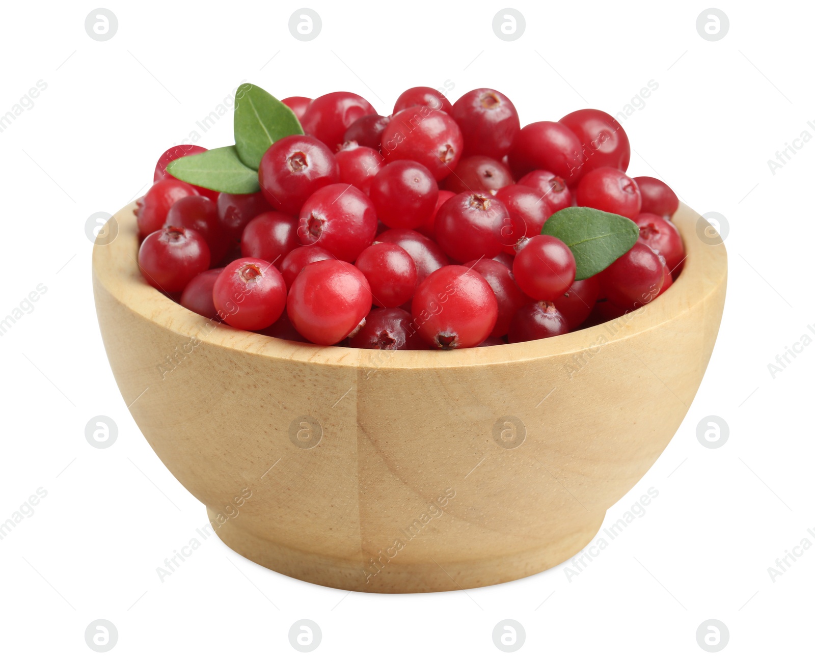 Photo of Wooden bowl of fresh ripe cranberries with leaves isolated on white