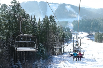 Photo of Beautiful mountain landscape with chairlift. Winter vacation