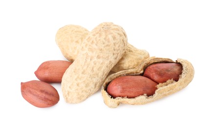 Photo of Fresh peanuts isolated on white. Healthy snack