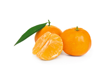 Photo of Fresh juicy tangerines with green leaves isolated on white
