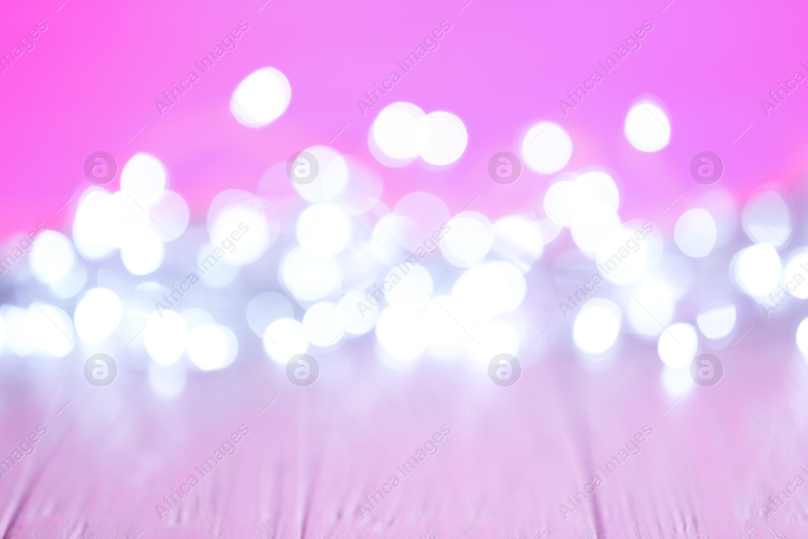 Photo of Beautiful abstract background with blurred white Christmas lights