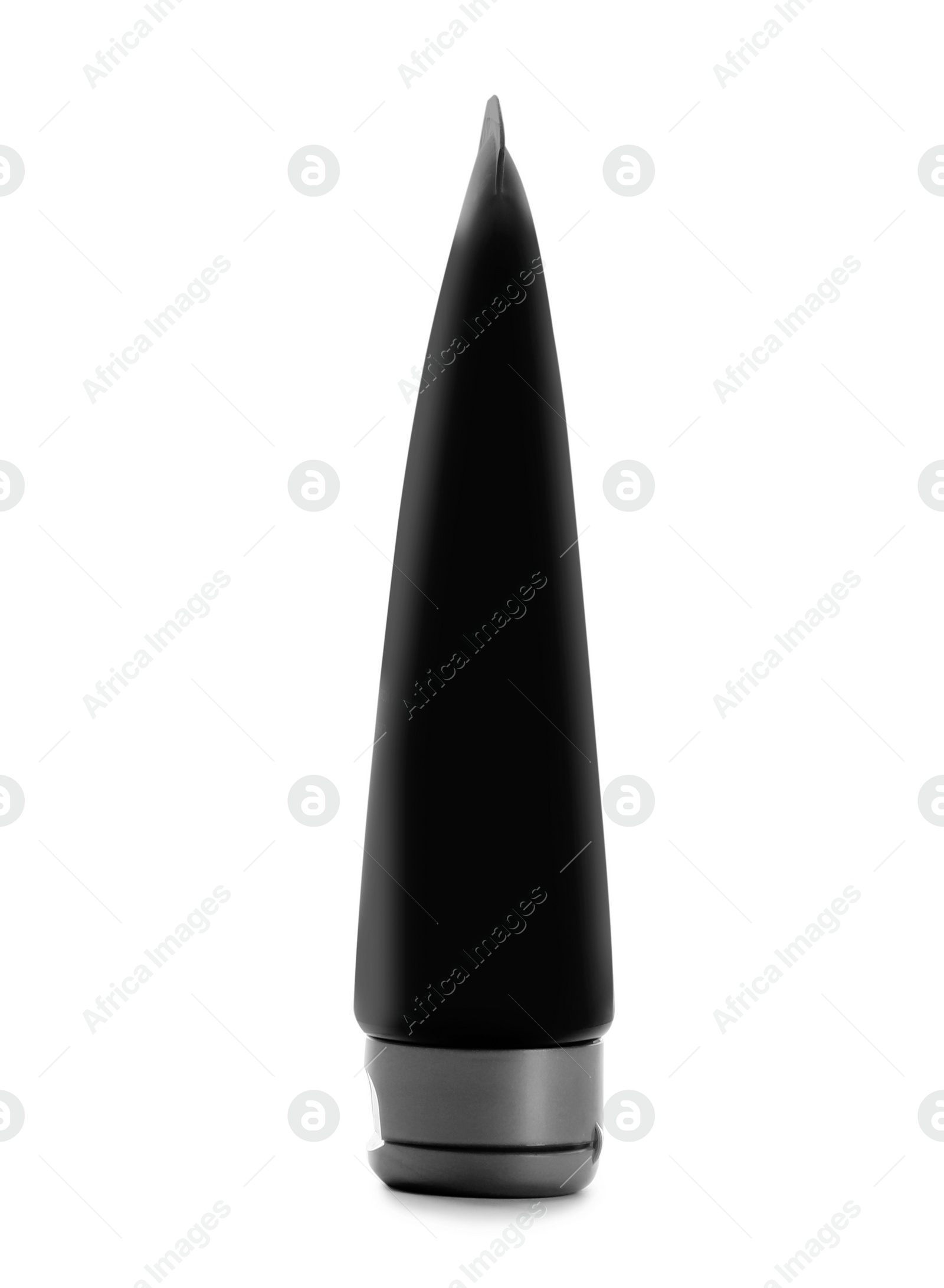 Photo of Black tube against white background. Cosmetic product for men