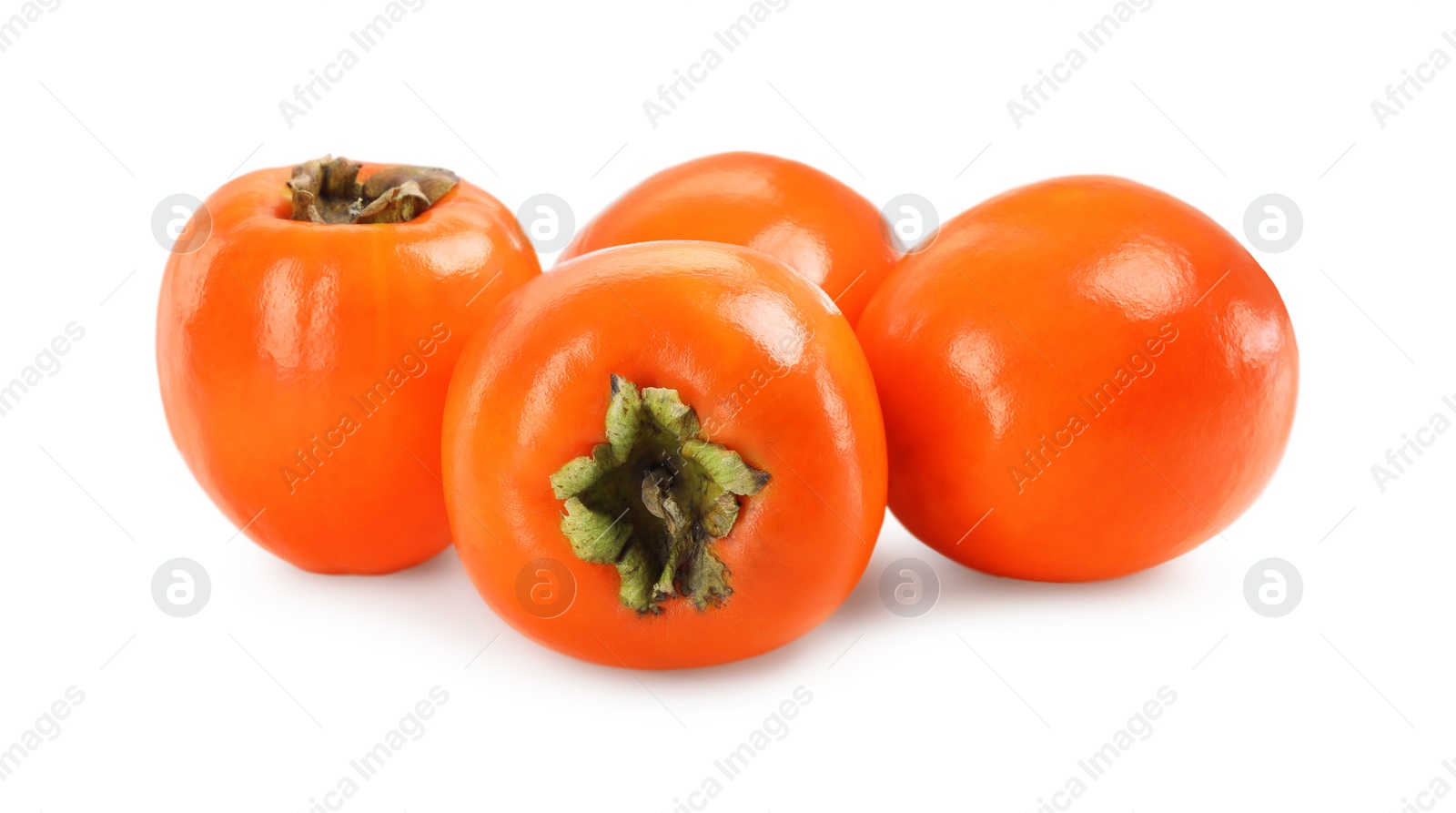 Photo of Delicious ripe juicy persimmons isolated on white