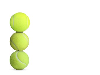 Image of Stack of tennis balls on white background. Space for text