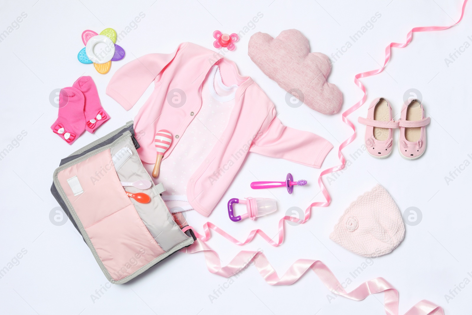 Photo of Composition with maternity bag and baby accessories on white background, top view