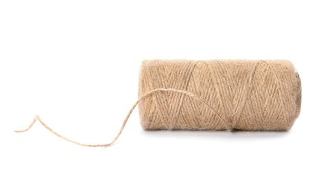 Photo of Spool of hemp rope on white background