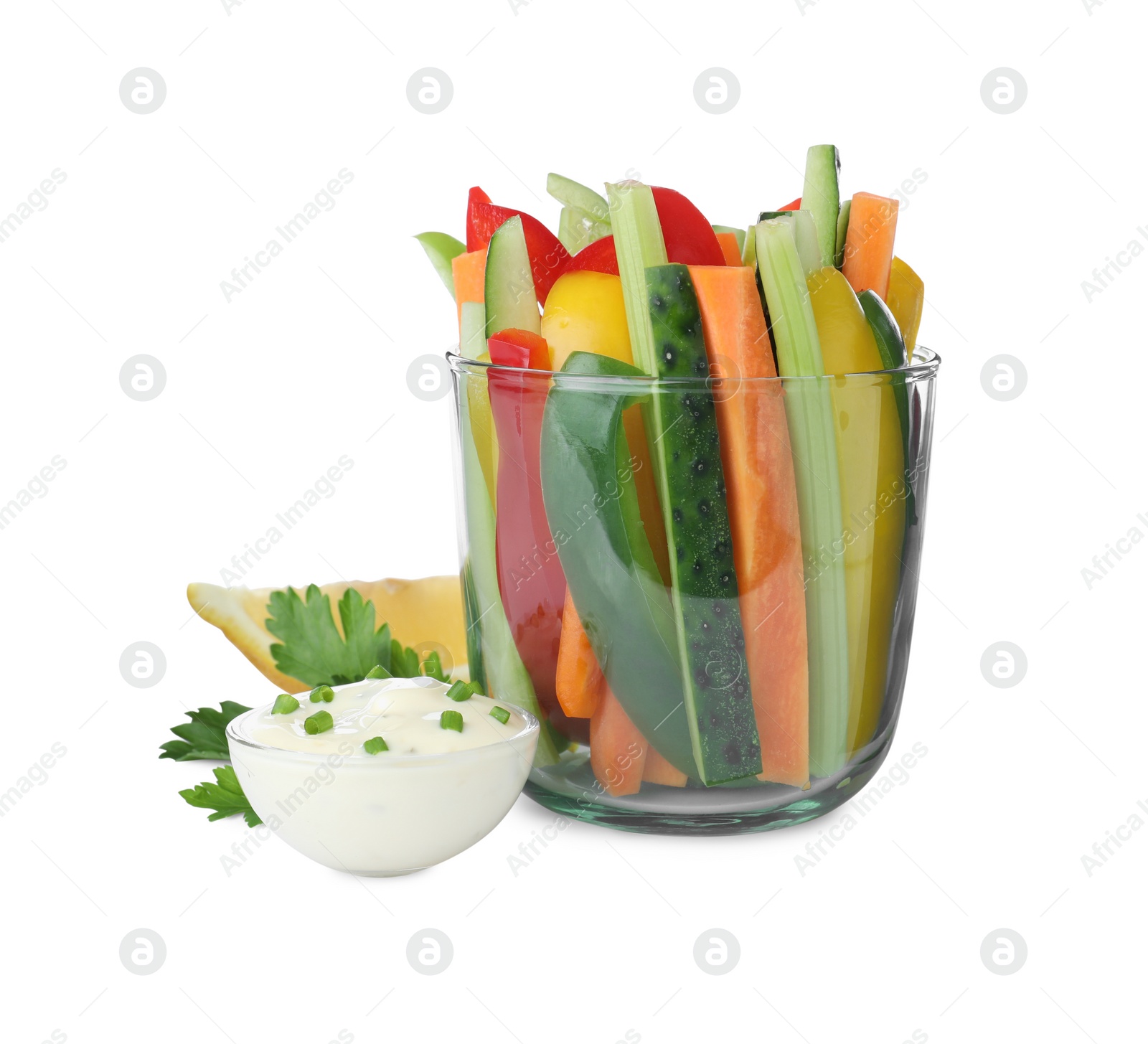 Photo of Different vegetables cut in sticks and bowl with dip sauce on white background