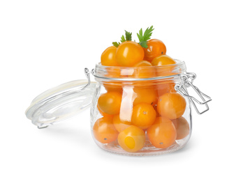 Pickling jar with fresh yellow tomatoes isolated on white