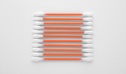 Photo of Many clean cotton buds on white background, top view