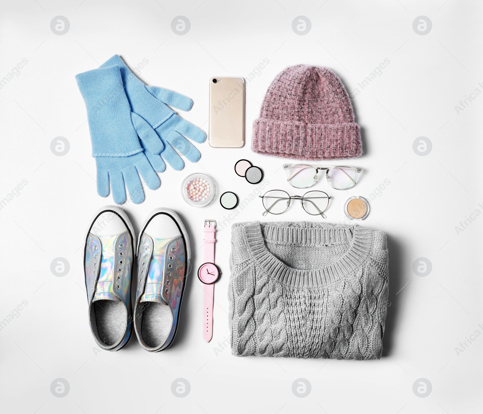 Photo of Stylish female autumn outfit and accessories on white background, flat lay. Trendy warm clothes