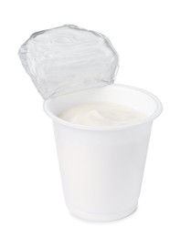 Plastic cup with delicious organic yogurt isolated on white