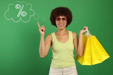 Happy woman with shopping bags implying discount offer on green background. Thought bubble with percent sign near her