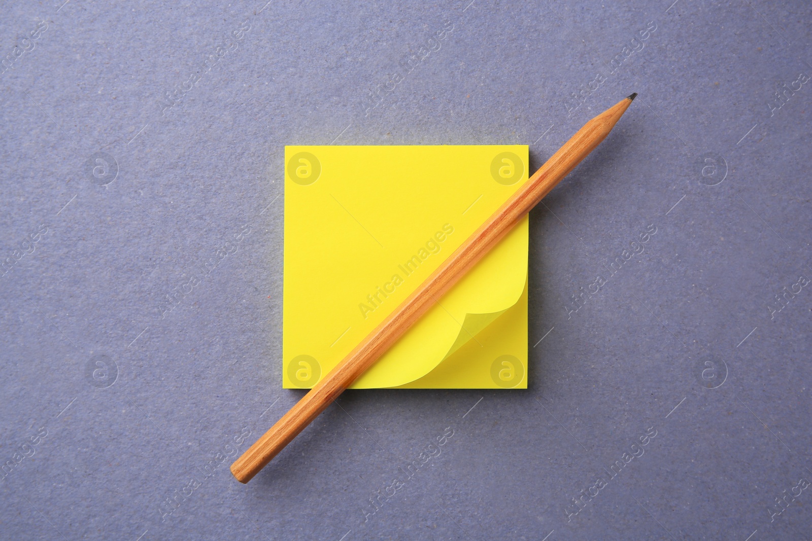 Photo of Blank paper note and pencil on color background, top view