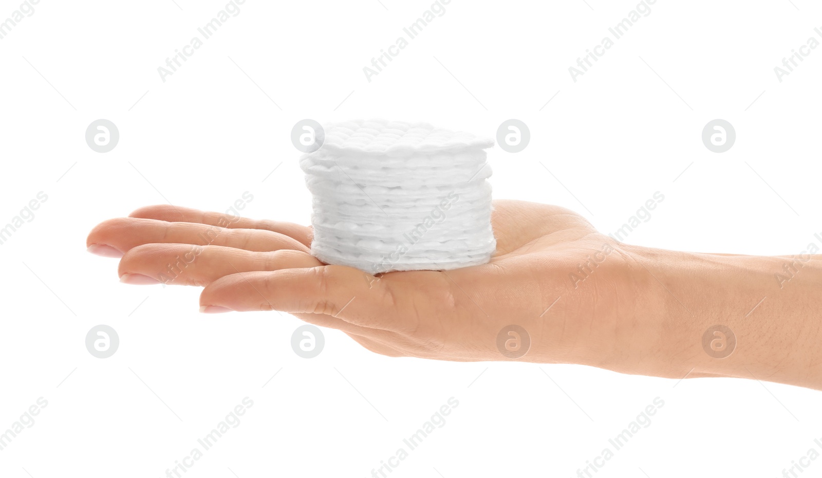 Photo of Woman holding cotton pads on white background, closeup