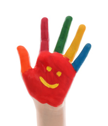 Photo of Kid with smiling face drawn on palm against white background, closeup