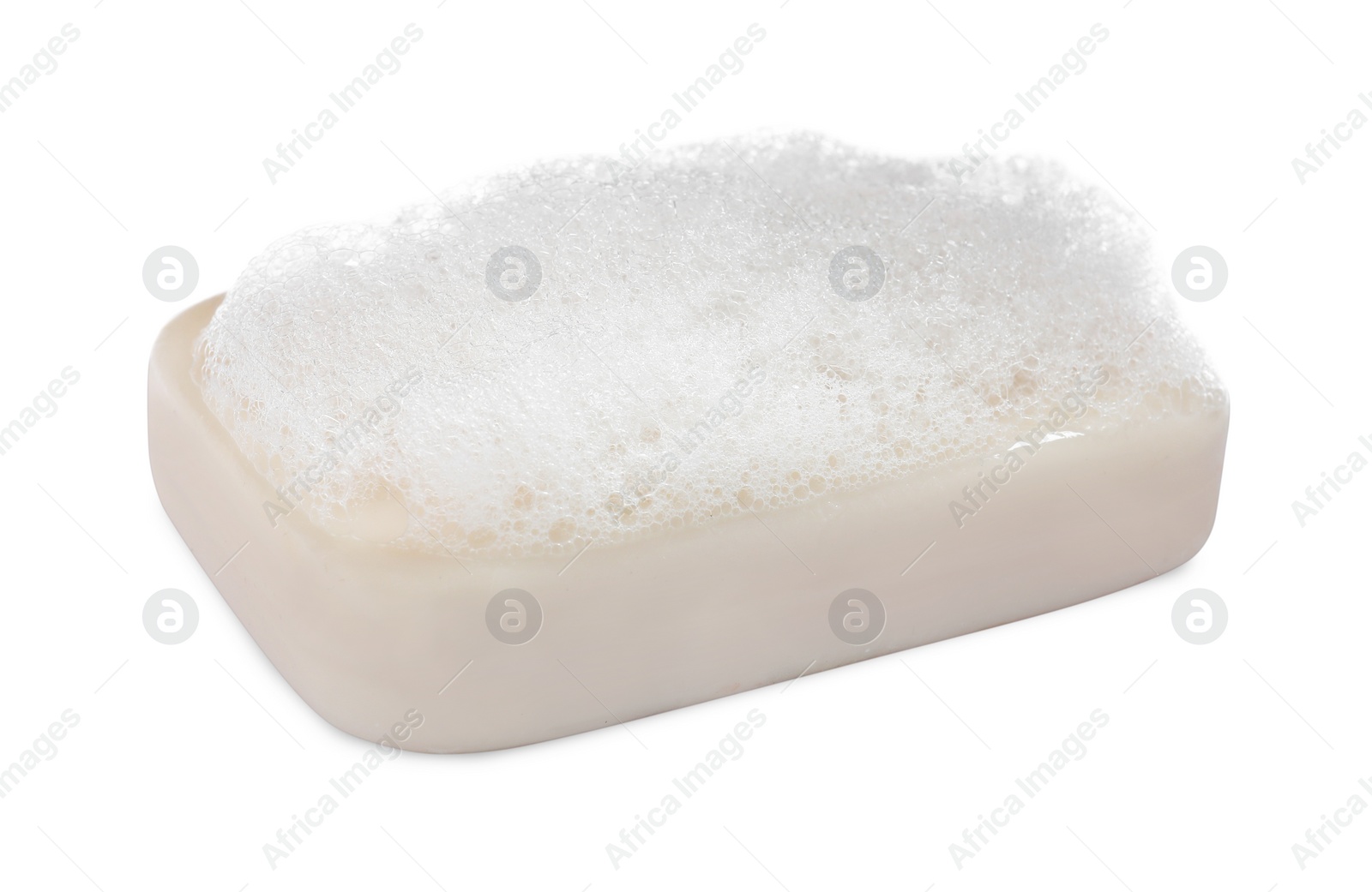 Photo of Soap bar with fluffy foam on white background