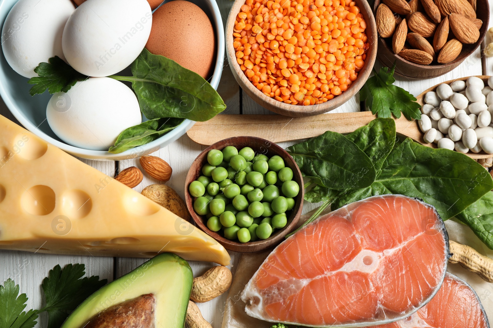 Photo of Products rich in protein on table, flat lay