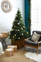 Beautiful interior with decorated Christmas tree in living room