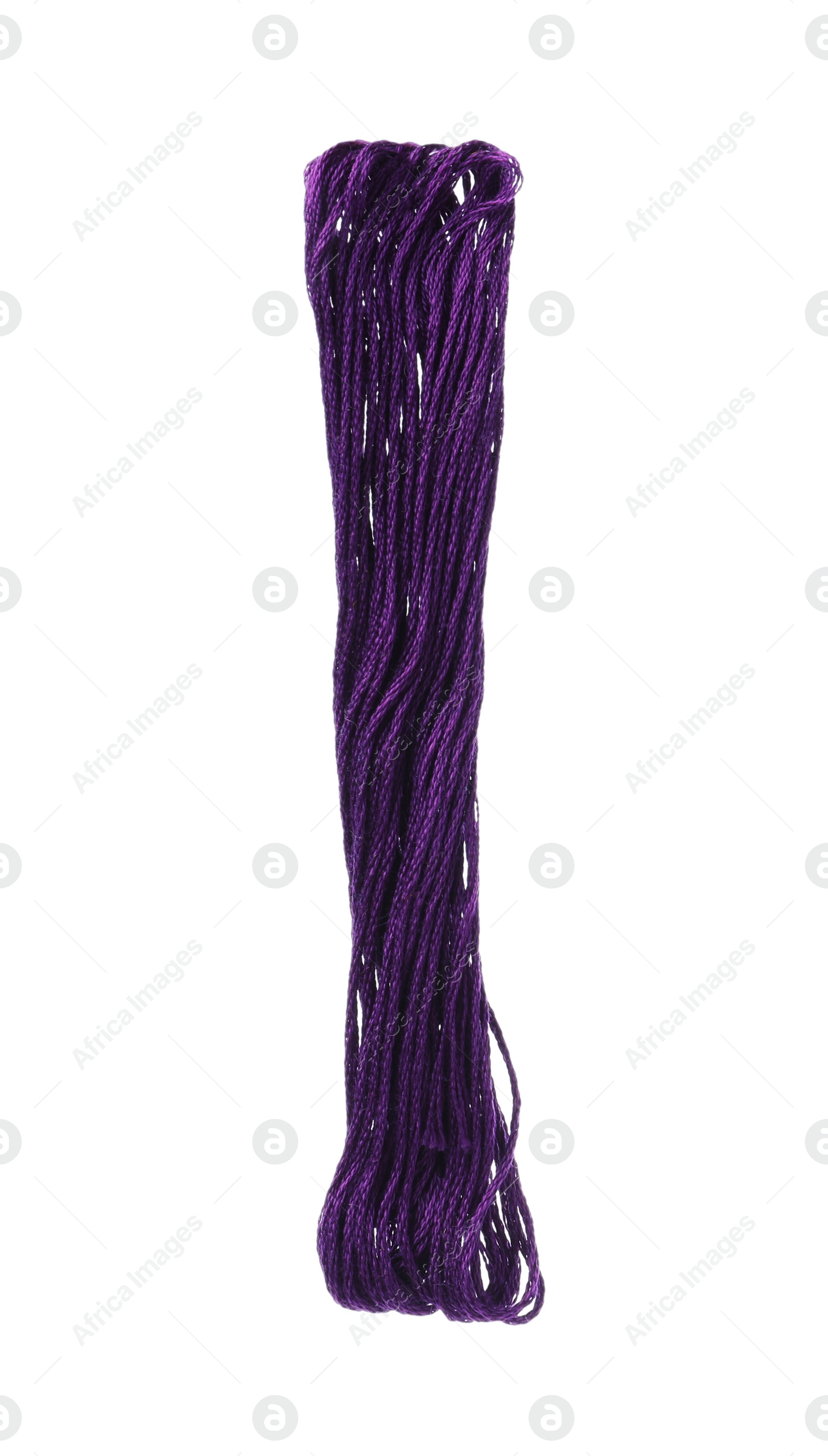 Photo of Bright purple embroidery thread on white background