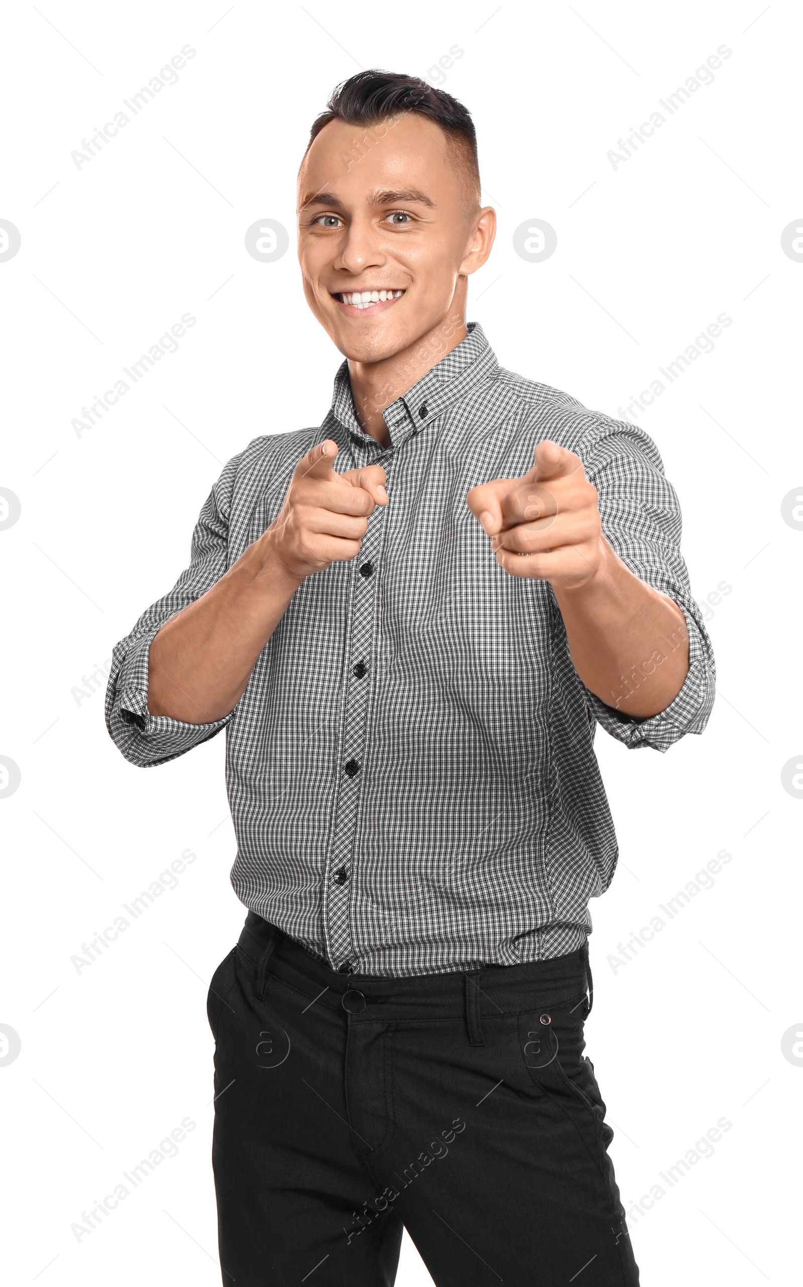 Photo of Young man in casual clothes posing on white background
