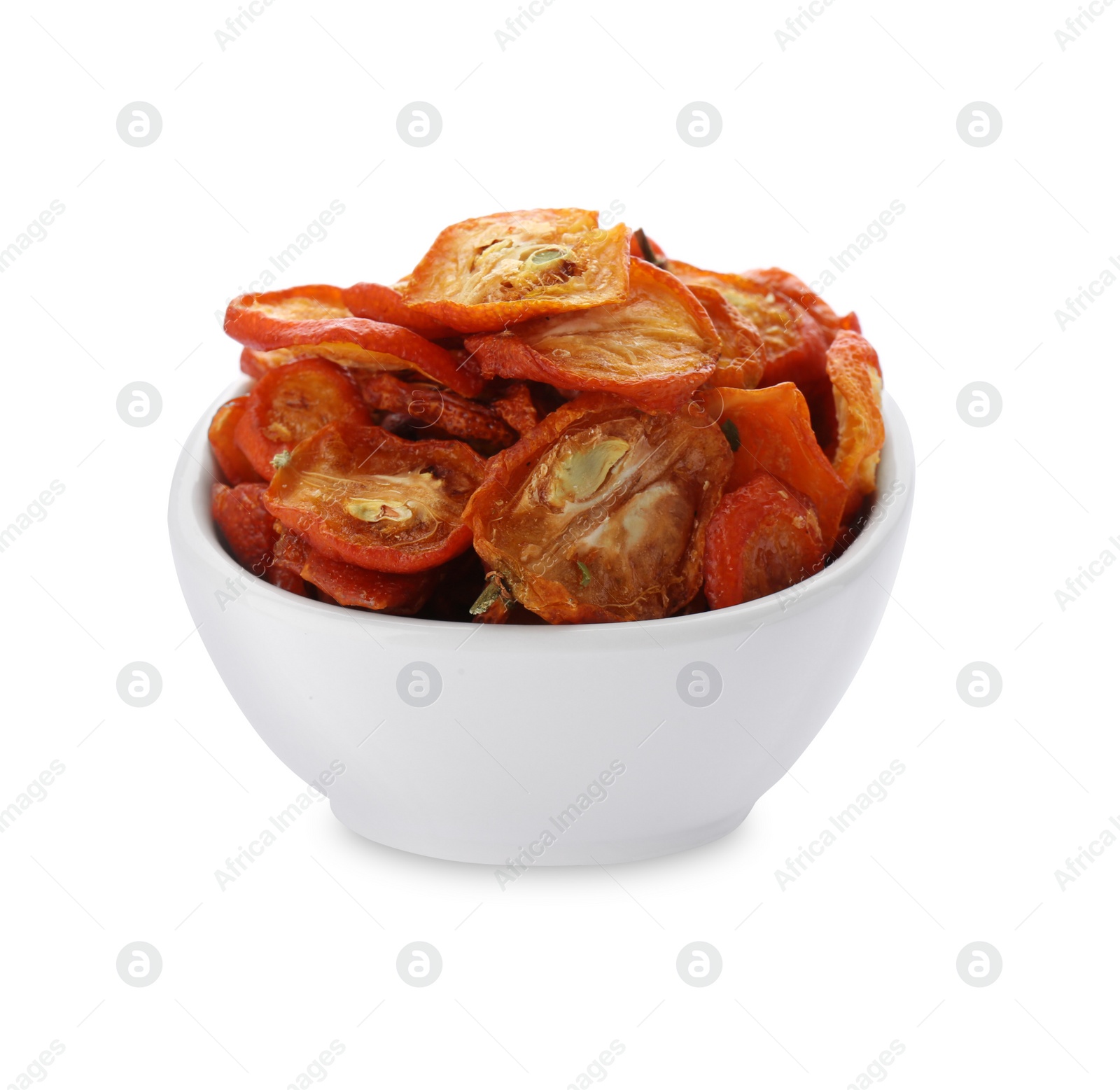 Photo of Bowl of cut dried kumquat fruits isolated on white