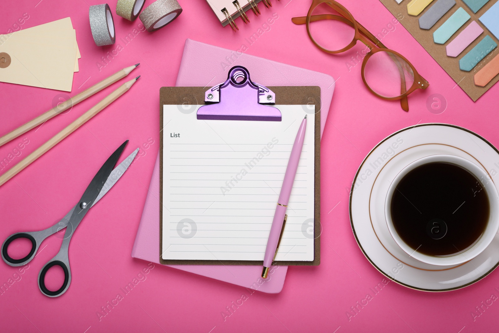 Photo of To do notes, stationery, planner and cup of coffee on pink background, flat lay. Space for text