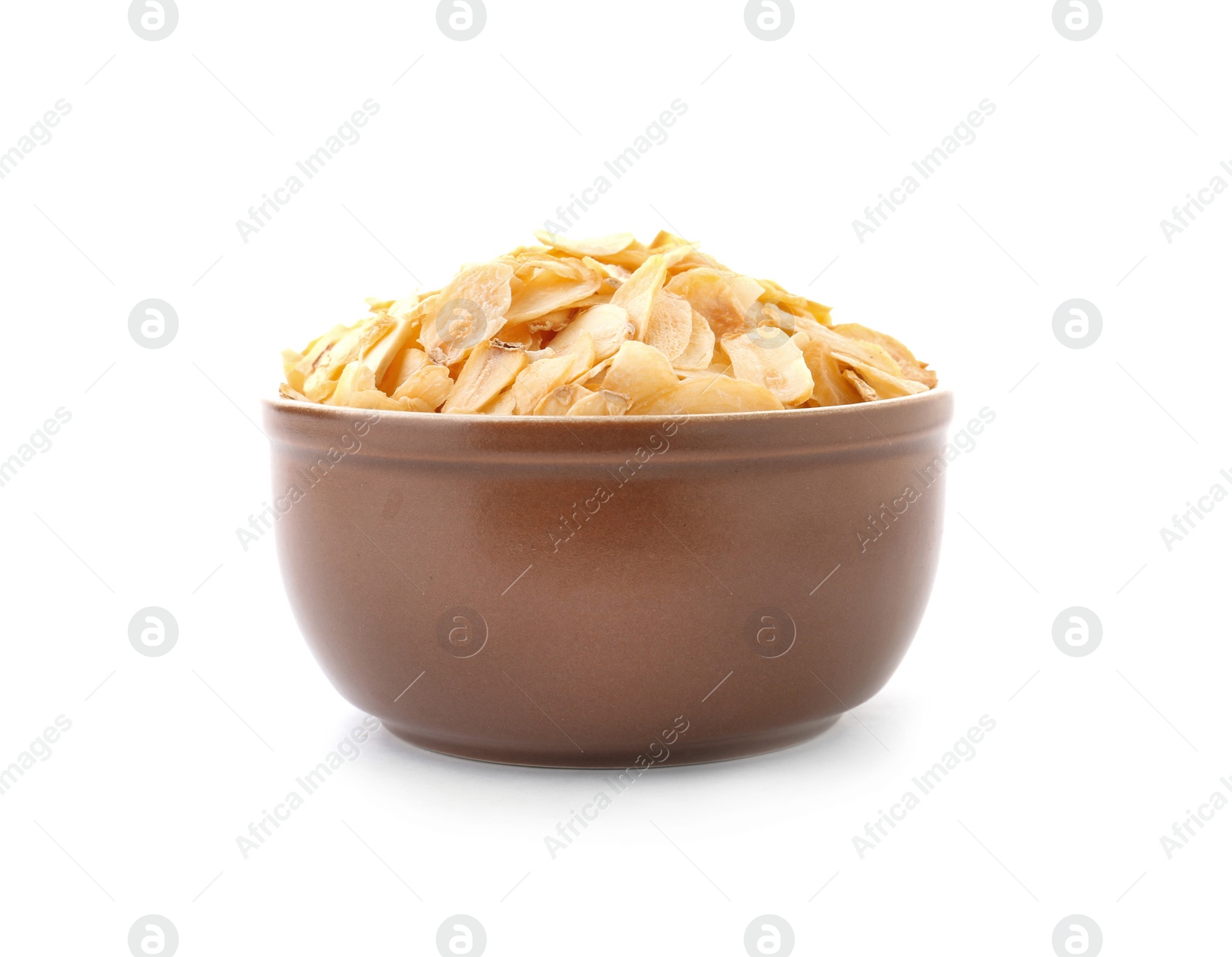 Photo of Dried garlic flakes in bowl on white background