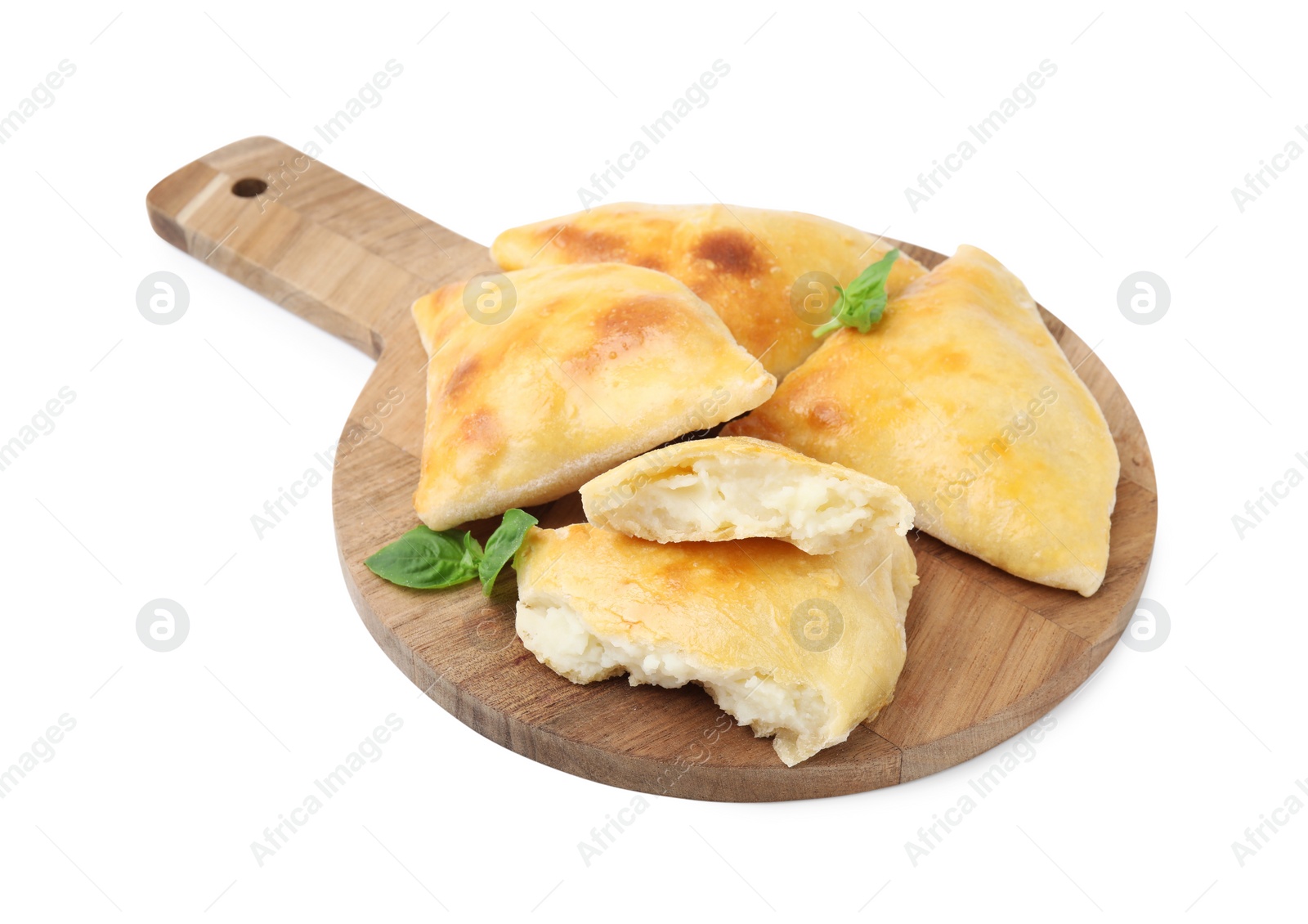 Photo of Wooden board with delicious samosas and basil isolated on white