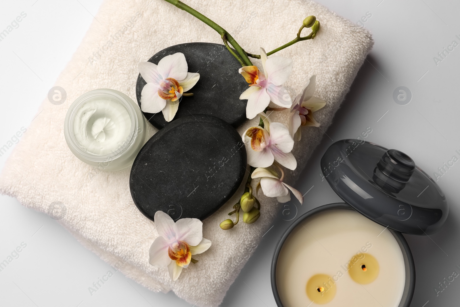 Photo of Flat lay composition with different spa products on white background