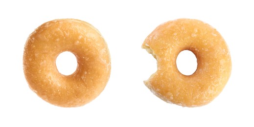 Image of Whole and bitten tasty donuts with sprinkles isolated on white