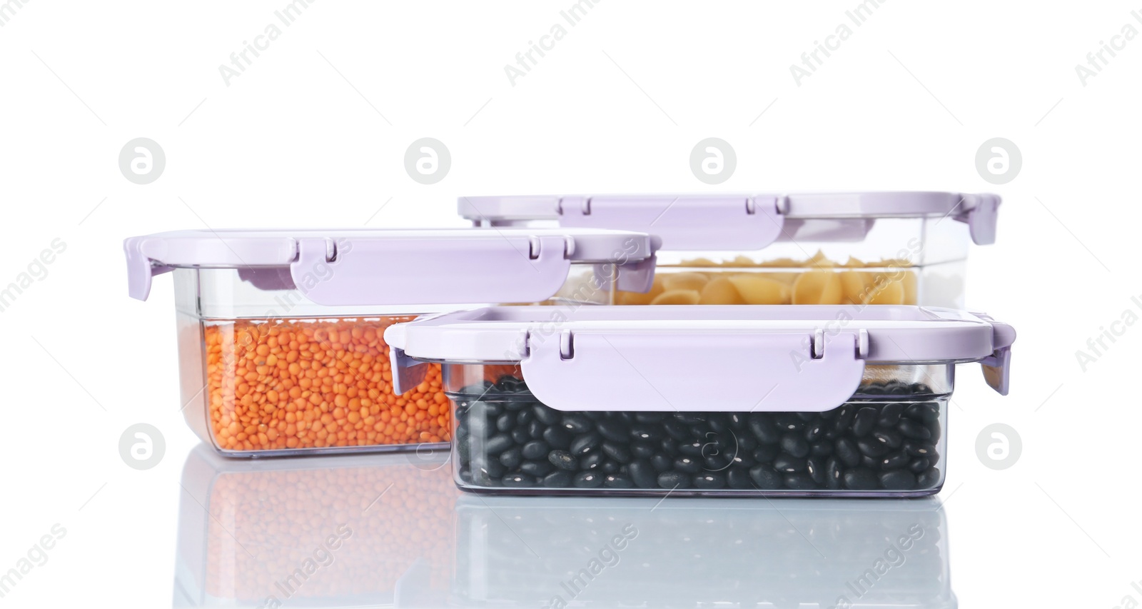 Photo of Boxes with uncooked products on white background