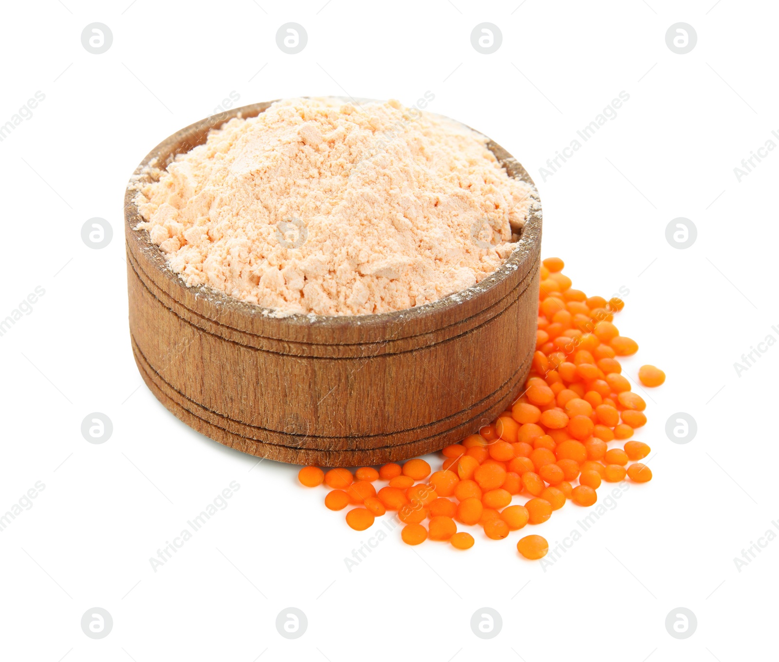 Photo of Lentil flour in wooden bowl and seeds isolated on white