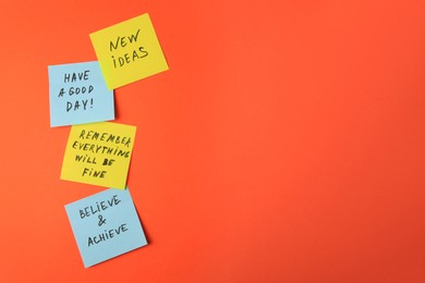Photo of Paper notes with life-affirming phrases on orange background. Space for text