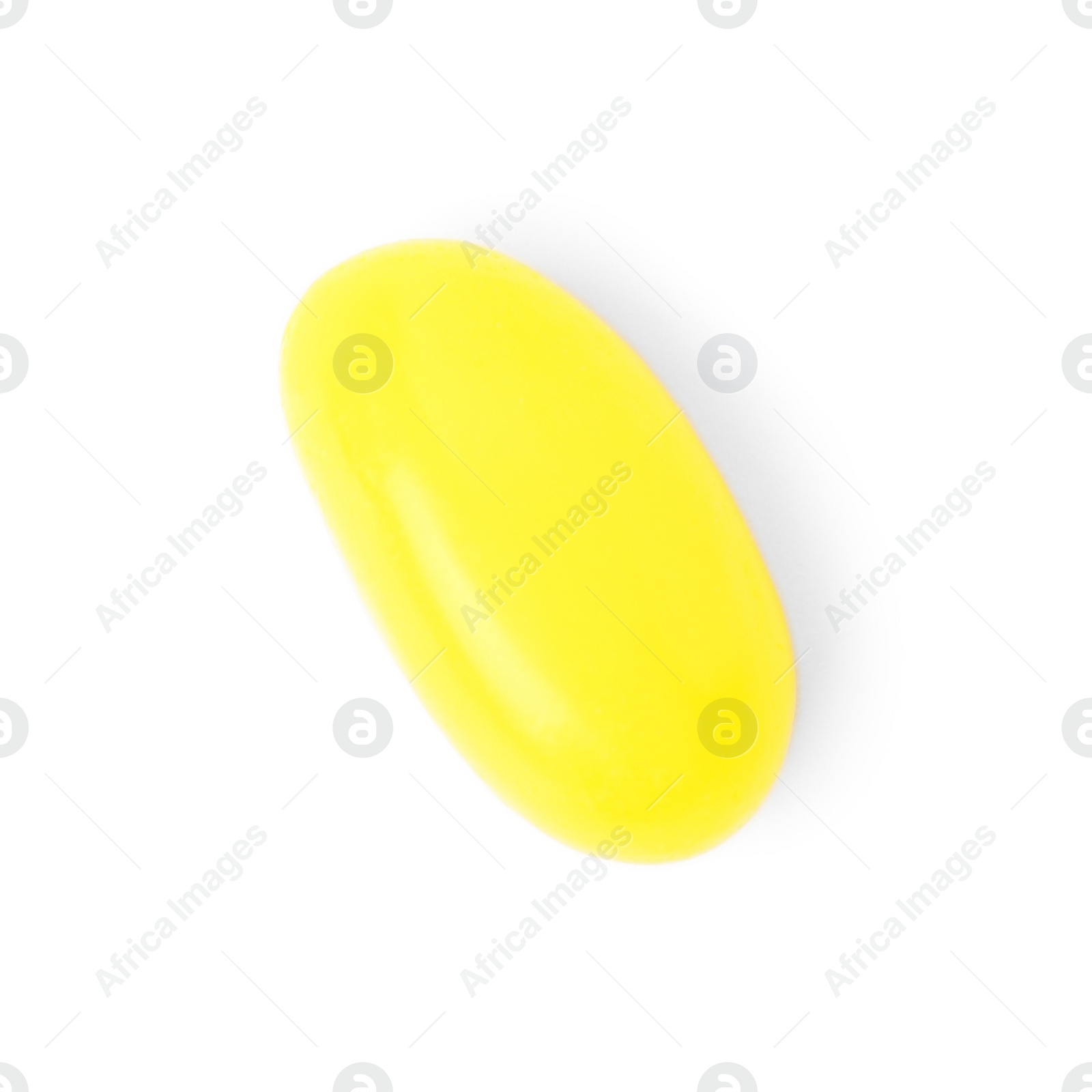 Photo of Tasty yellow jelly bean isolated on white, top view