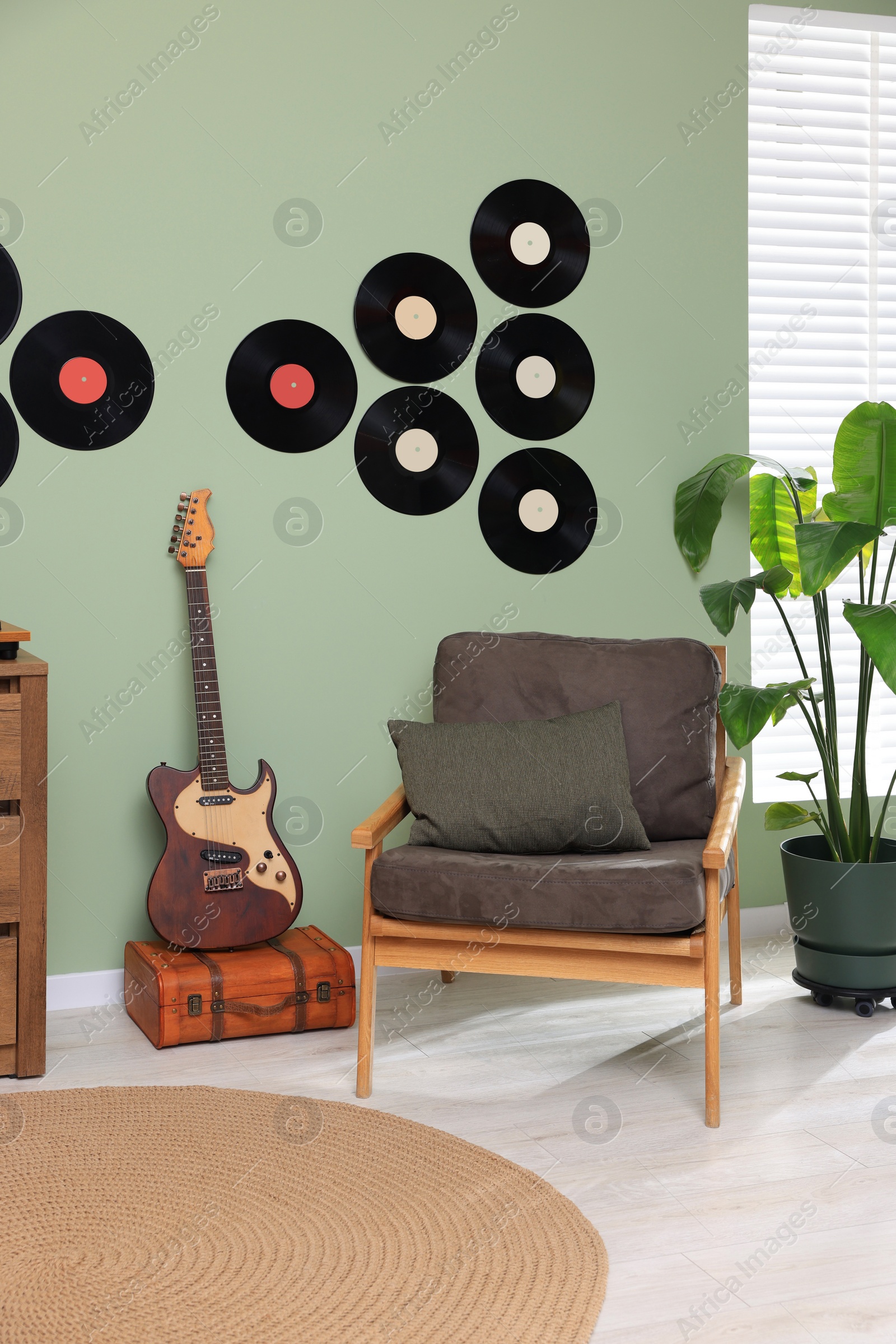 Photo of Living room interior decorated with vinyl records