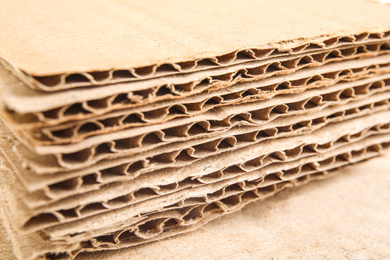 Photo of Sheets of brown corrugated cardboard, closeup view