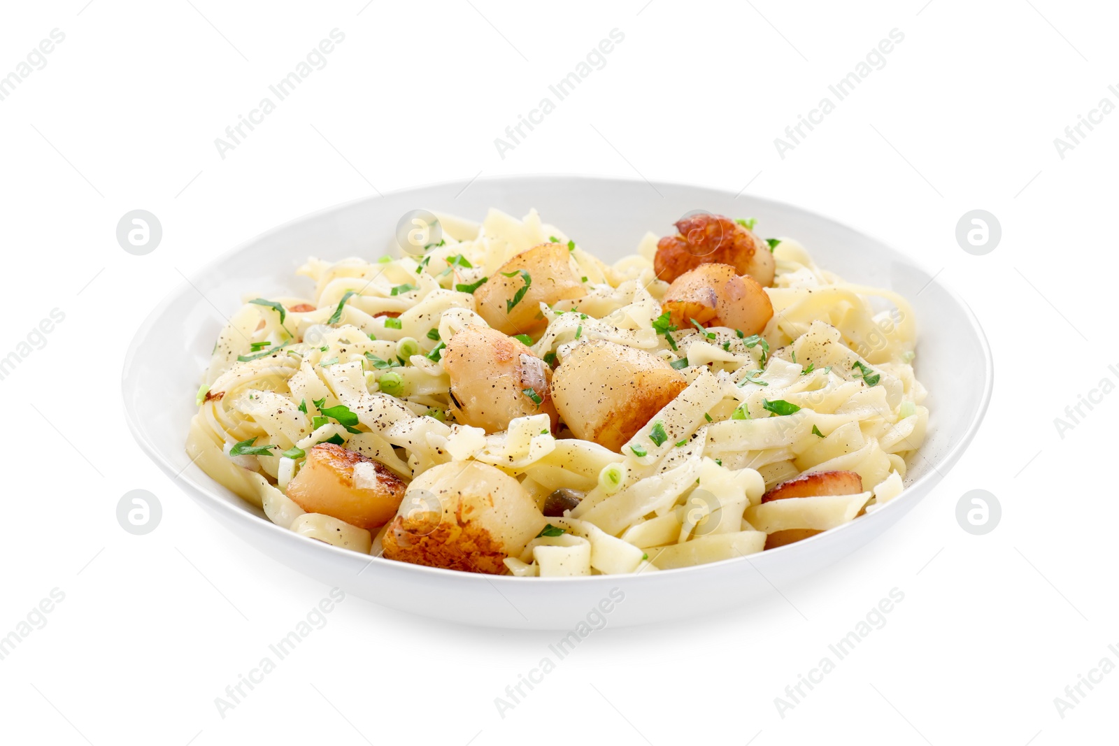 Photo of Delicious scallop pasta with spices in bowl isolated on white