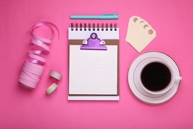Photo of To do notes, planner, stationery and cup of coffee on pink background, flat lay. Space for text